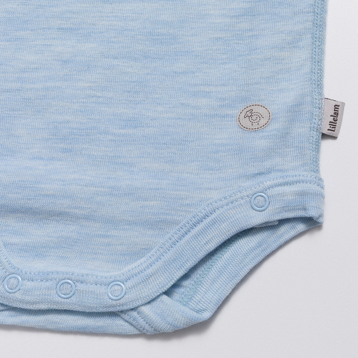 LILLELAM Ullbody Lyseblå